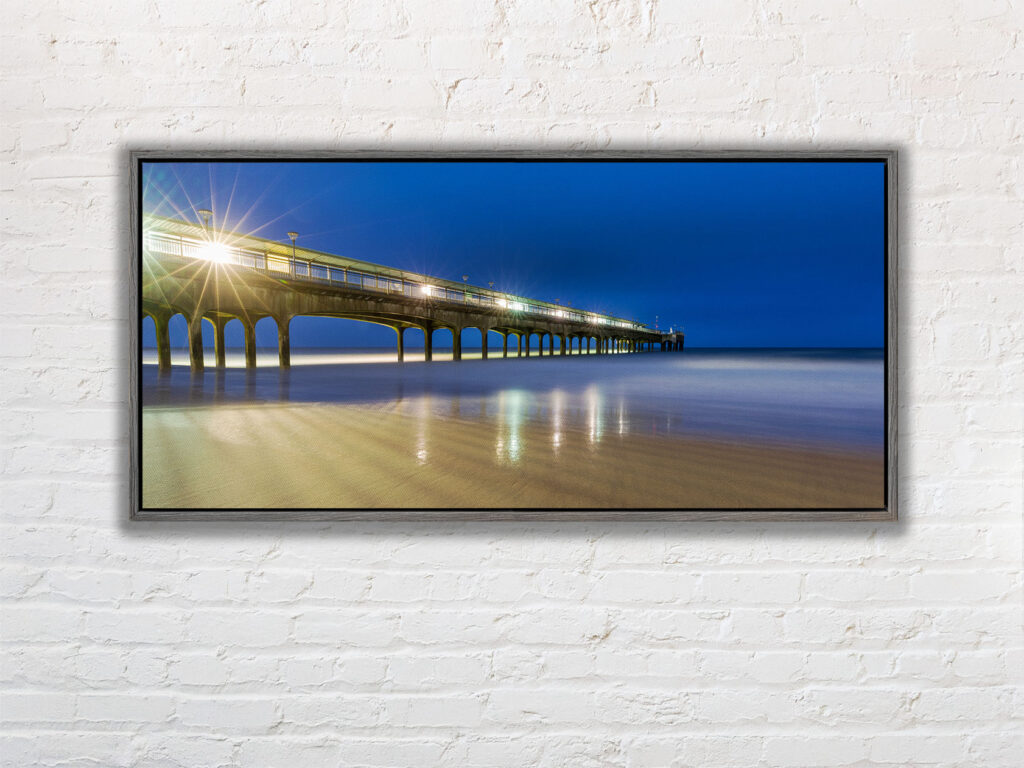 A Grey framed canvas print of Boscombe pier