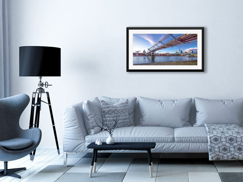Framed print of Millennium Bridge & St. Pauls, London, mounted on a modern lounge wall